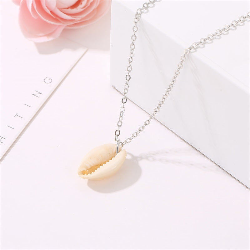 COWRIE SHELL PENDANT
